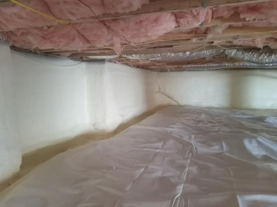 Crawl space encapsulation with closed-cell spray foam for Commercial Roof Restoration in Edgewater